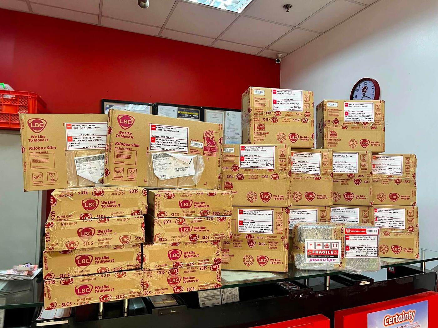 LBC parcels stacked inside the Peanut PC shop
