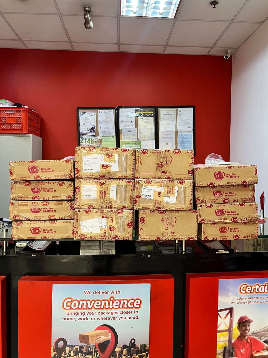 Shop counter in Trece Martires with LBC boxes ready to go